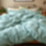 Elegant aqua comforter spread across a cozy bed