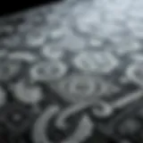 Intricate patterns of a grey vintage area rug