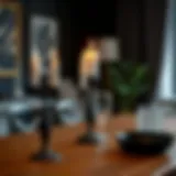 Stylish modern black candlestick set on a dining table