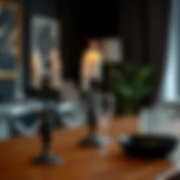 Stylish modern black candlestick set on a dining table