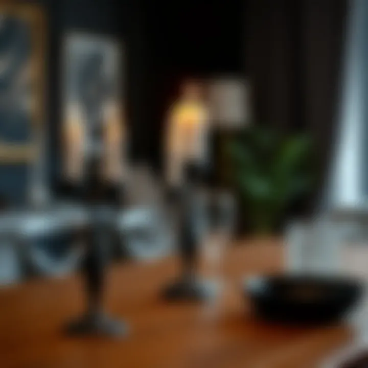 Stylish modern black candlestick set on a dining table