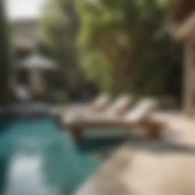 Elegant Sunbed Arrangement by Swimming Pool Elegant sunbed arrangement by a swimming pool