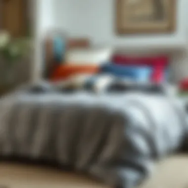 Grey Comforter with Colorful Pillows Grey comforter paired with colorful pillows in a decorative setting