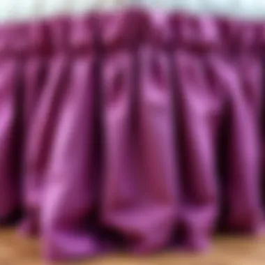 Luxurious Fabric Textures of Purple Ruffle Bed Skirt Close-up of luxurious fabric textures of a purple ruffle bed skirt