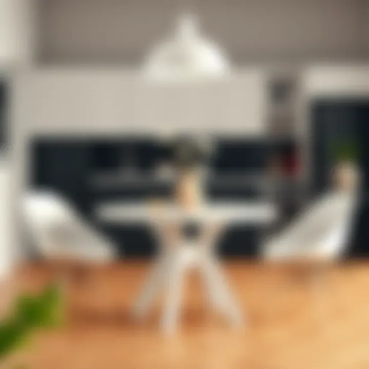 Stylish small round white dining table set in a modern kitchen