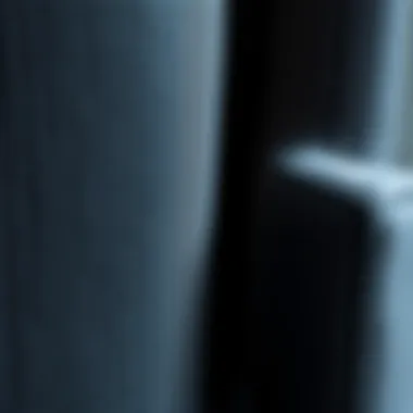 Close-up of Dark Grey Chair Fabric A close-up view of the fabric texture of a dark grey chair.