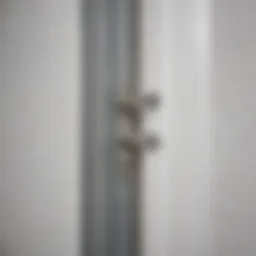 Close-up view of a plastic closet door track showcasing its durable design