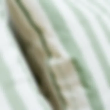 Close-up of green and white striped pillow showcasing texture
