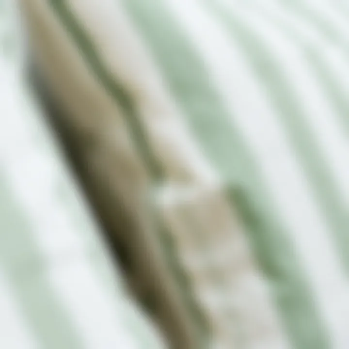 Close-up of green and white striped pillow showcasing texture