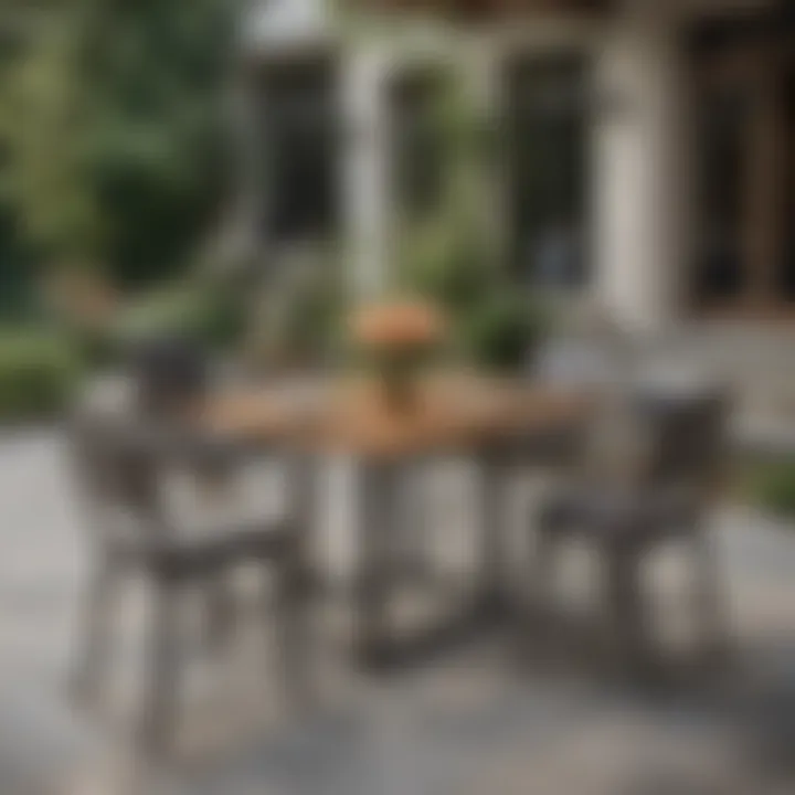Stylish high top outdoor table arrangement with chairs