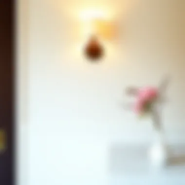 A Stunning Wall Sconce Enhancing Bathroom Elegance Elegant wall sconce illuminating a stylish bathroom vanity