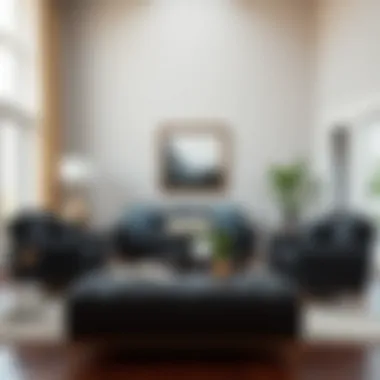 Stylish arrangement of a black leather sofa, chair, and ottoman in contemporary interior