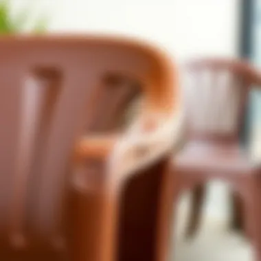 Durable Texture of Brown Plastic Chairs A close-up view highlighting the texture and durability of brown plastic material.