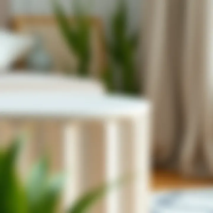 Close-up of a small off-white end table showcasing its textural details