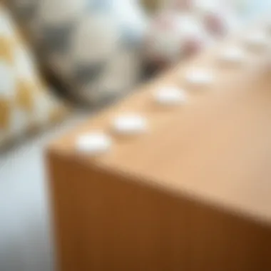 Aesthetic Appeal of Concealed Screw Holes Close-up of round white stickers on furniture
